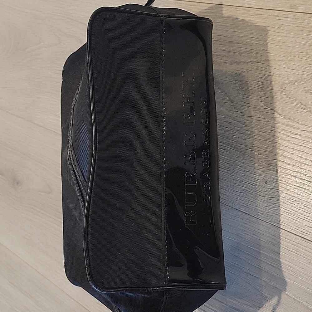 Burberry toiletry bag with signature black plaid interior